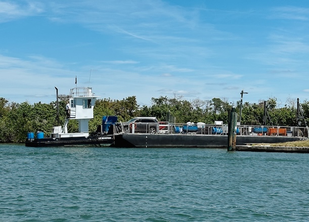 Boat docked near lush green private beaches in Sarasota